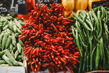 Chilli and Jalapeño peppers on a market stall 