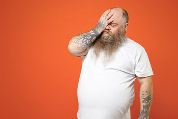 Fat pudge obese chubby overweight tattooed blue-eyed bearded man 30s has big belly wearing white...