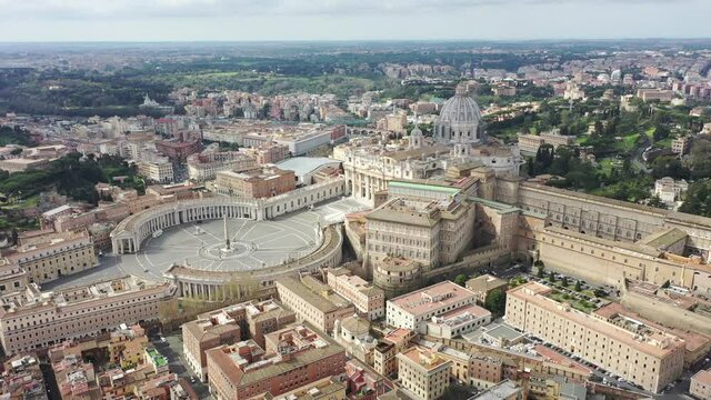St. Peter's Basilica in Rome and its imposing square. Italy, Vatican.
Aerial shot with drone. Roma, San Pietro, Vaticano 