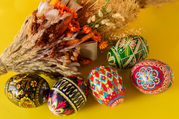 Colorful Easter eggs and colorful Easter palm 