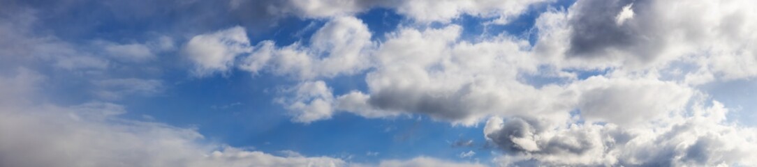 Panoramic View of Cloudscape during a colorful and sunny winter day. Taken on the West Coast of British Columbia, Canada.