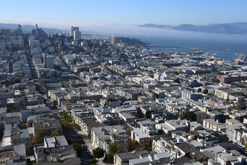 Fototapeta na wymiar Beautiful aerial view of the San Francisco, USA. View of the Downtown, San Francisco bay and long steep streets.