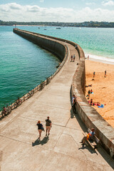 Big pier, looking down over the snaking boardwalk at Saint-Malo, France on a sunny day
