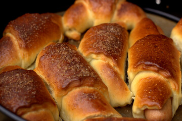 
Small buttery bagels with sausage and other stuffing