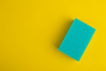 Kitchen washcloth on yellow background. Sponges. Washcloths for cleaning.