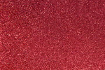 Red abstract blured background with shimmer, glitter and shine. Merry Christmas or new year bokeh. Saint Valentine day card. Copy space