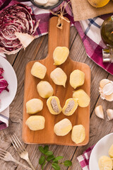 Potato gnocchi stuffed with radicchio and ricotta.
