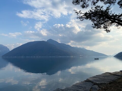 Lake view, Lugano mountains, Switzerland. Melide, sunny day.