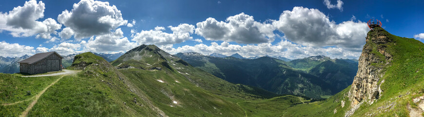 panorama of mountains with path, hut and view on the rock, Stubnerkogel, Austria