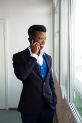 handsome african man with mobile phone 