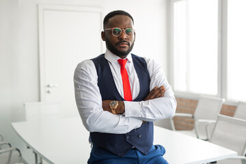portrait of handsome african man in office 