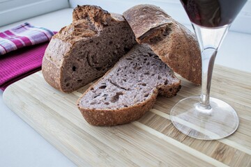 Homemade rye bread and red wine