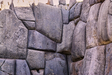 A corner detail of a  stone wall with the typical incan stone construction in Tambomachai, Peru