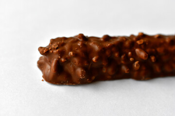 Delicious chocolate bar with nuts in a package