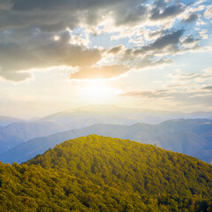 beautiful green mountain valley at the sunset, evening outdoor travel scene