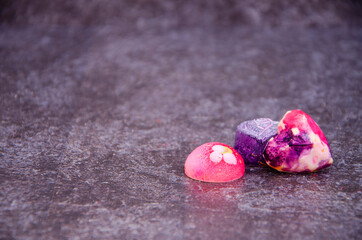 Brightly decorated chocolates filled with chocolates