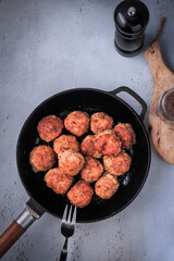 Easy Homemade Meatballs in a frying pan. Top view.   