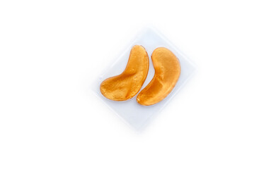 Gold eye patches, eye mask  isolated on white background.