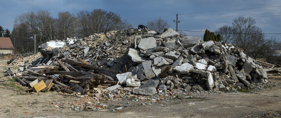 Heap of construction waste, concrete and brick