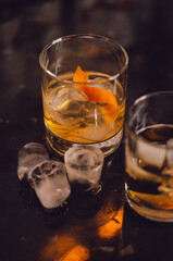 whiskey and ice with orange peel