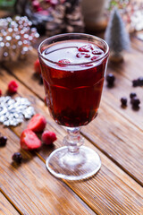 appetizing drink with strawberries and other berries on the table