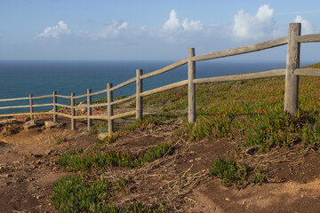 sand green road with nice view on the atlantic ocean in Portugal