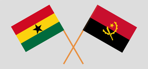Crossed flags of Ghana and Angola. Official colors. Correct proportion