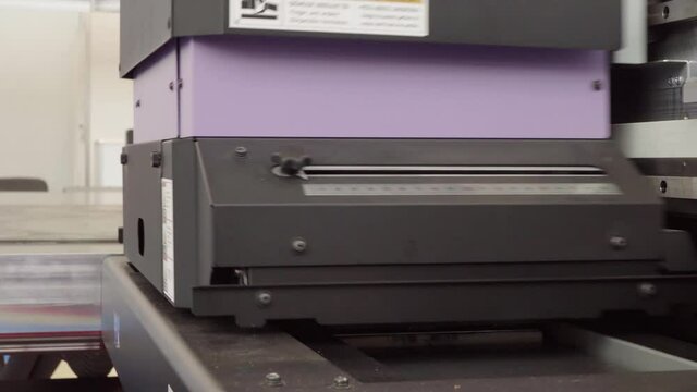 Large format high speed industrial ultraviolet printer for printing promotional products