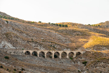 Fototapeta na wymiar Old aqueduct part of the mining area in Riesi, Italy