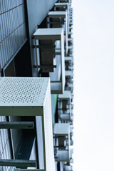 Fototapeta premium Facades of houses with air-conditioning boxes. New homes immediately provide air conditioning and places for them.