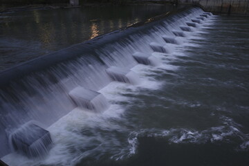 Water flowing over dam