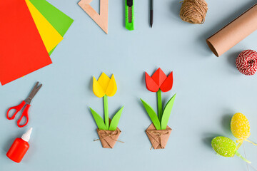 Tulips made of colored paper. Step-by-step instructions. Step 8 Connect and glue the flower and the pot. Flat lay. DIY