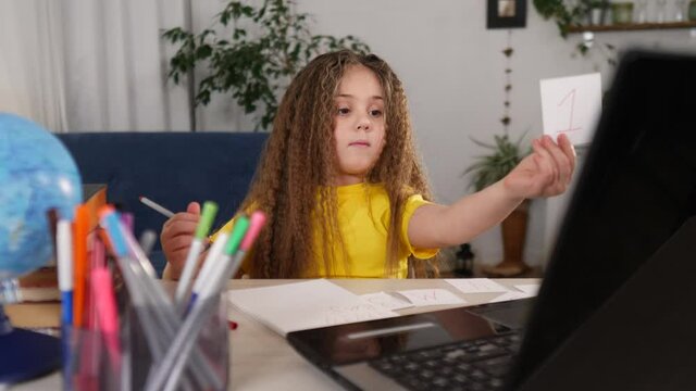 coronavirus. child at school home in a lesson. learning education pandemic coronavirus concept. virtual kid learn online learning school. online learning at study home. distance education