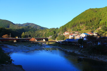 Fototapeta premium Hiking the Japanese Kumano Kodo Pilgrimage Trail - Nakahechi Route (熊野古道 - 中辺路コース) | Koguchi town (小口)