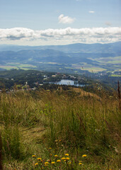 Naklejka premium picturesque summer view on the mountains from the top