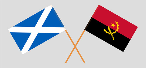 Crossed flags of Scotland and Angola. Official colors. Correct proportion