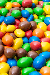 colored crunchy chocolate balls occupying the entire image