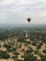 Bagan, Myanmar: Hot air balloons flying over the temples of Bagan, an UNESCO World Heritage Site