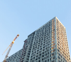 Fototapeta premium construction building office and residential focus from bottom to top on sky background