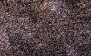 square stone tiles dark brown stones old and weathered