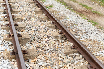 railroad tracks iron rails vertical on gravel background