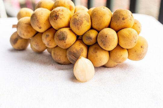 ripe fruit of thailand long kong yellow branch with white berry