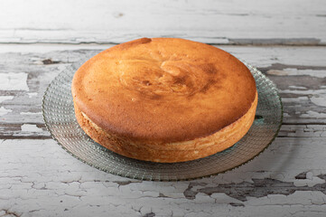 Manioc cake with rustic wood background