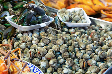 seafood fish market Blood cockle, Green mussel closeup, selective focus