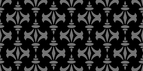 Decorative background pattern with gray ornaments on a black background