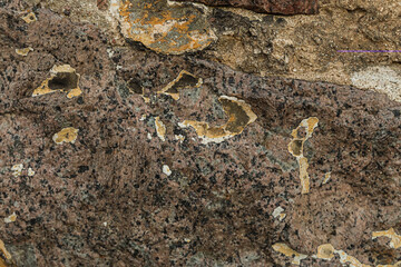 stone background dark brown old and weathered base hard and uneven
