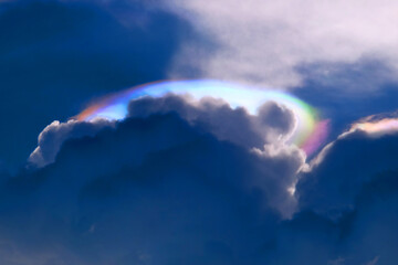 Fire rainbow clouds phenomenon during sunny day