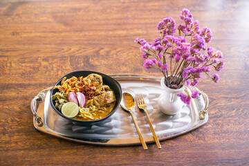Khao soi - Traditional Thai Food, Thai curry with  A noodle dish in a yellow curry with chicken