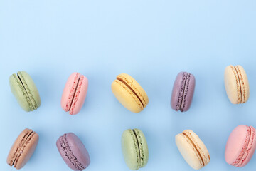 macarons of all colors are on the table