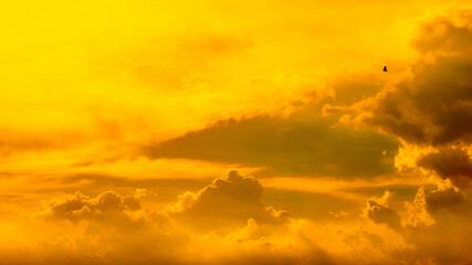 Dramatic clouds and sky like heaven view at sunset time. with gold or golden light tone.
